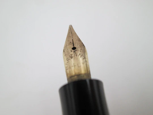 P.W fountain pen. Hard rubber and bitone metal. 14k gold nib. Lever filler. 1920's