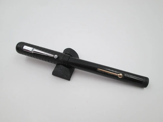 P.W fountain pen. Hard rubber and bitone metal. 14k gold nib. Lever filler. 1920's