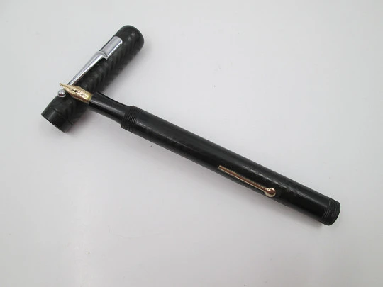P.W fountain pen. Hard rubber and bitone metal. 14k gold nib. Lever filler. 1920's