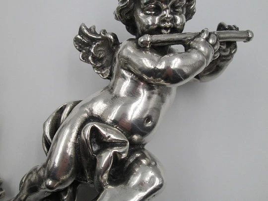 Pair of sculptures. Sterling silver laminated. Cherubs musicians. 1970's