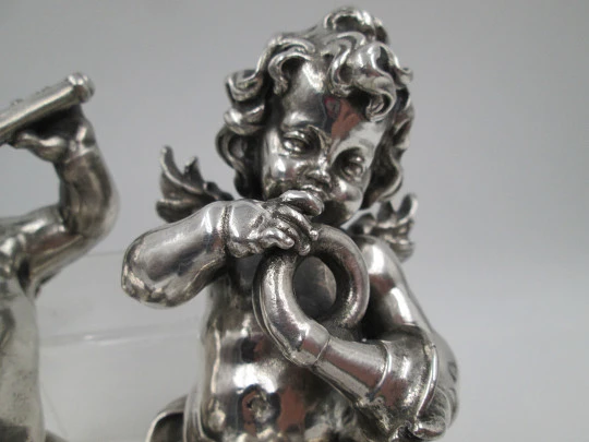 Pair of sculptures. Sterling silver laminated. Cherubs musicians. 1970's