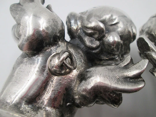 Pair of sculptures. Sterling silver laminated. Cherubs musicians. 1970's