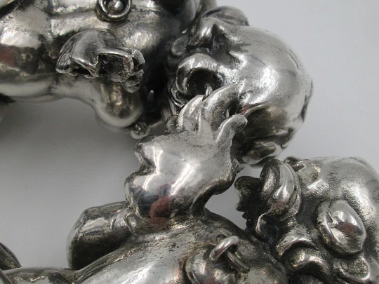 Pair of sculptures. Sterling silver laminated. Cherubs musicians. 1970's