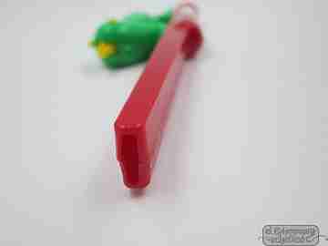 Pájaro canario silbador de juguete. Plástico de colores. España. Años 70