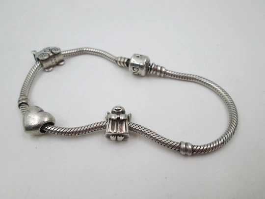 Pandora women's cord bracelet. 925 sterling silver. Hidden clasp. Heart and cherub