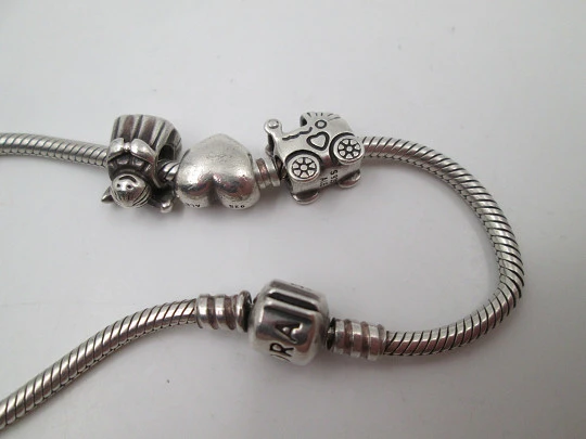Pandora women's cord bracelet. 925 sterling silver. Hidden clasp. Heart and cherub