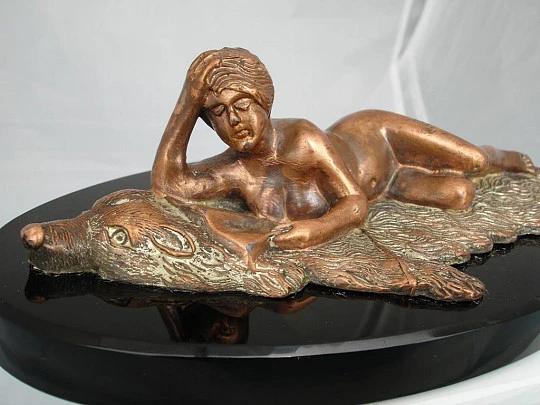 Paperweight. Bronze sculpture. Woman lying on bearskin. 1970's