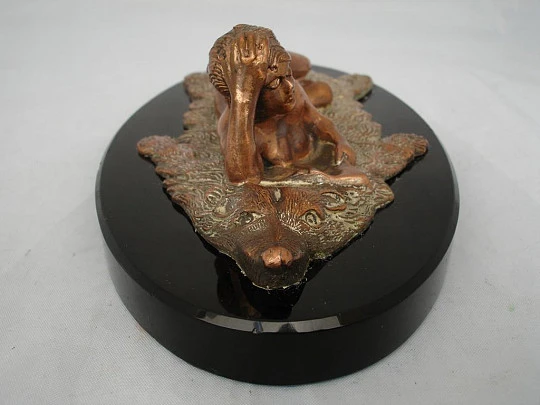 Paperweight. Bronze sculpture. Woman lying on bearskin. 1970's