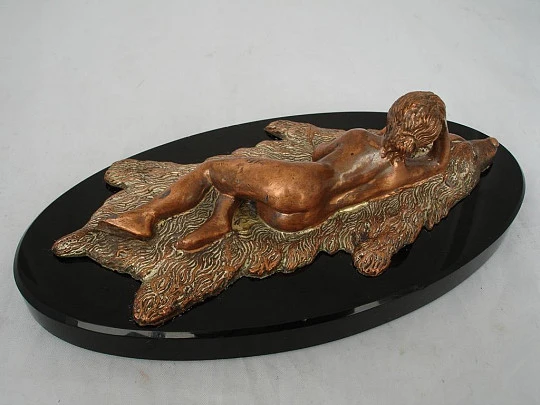 Paperweight. Bronze sculpture. Woman lying on bearskin. 1970's