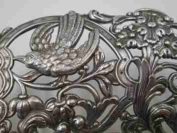 Pareja paneras troqueladas. Metal plateado. Caladas y decoradas