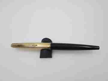 Parker 45 Custom. Gold plated and black plastic. 14 karat nib. Converter. 1965. USA