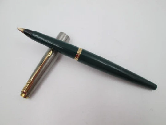 Parker 45 GT Acero inoxidable y chapados oro. Plástico verde. Aerométrica. 1960