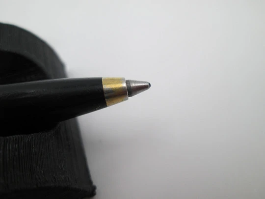 Parker 51 ballpoint pen. Black plastic and gold plated. Lines pattern. France. 1970's