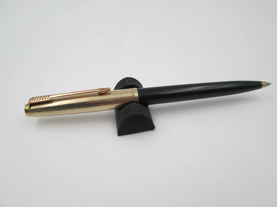 Parker 51 ballpoint pen. Black plastic and gold plated. Lines pattern. France. 1970's