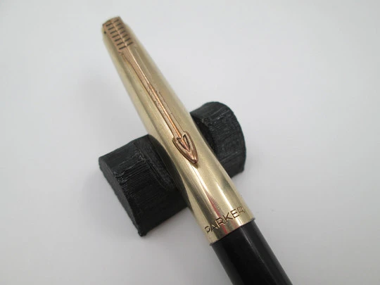 Parker 51 ballpoint pen. Black plastic and gold plated. Lines pattern. France. 1970's