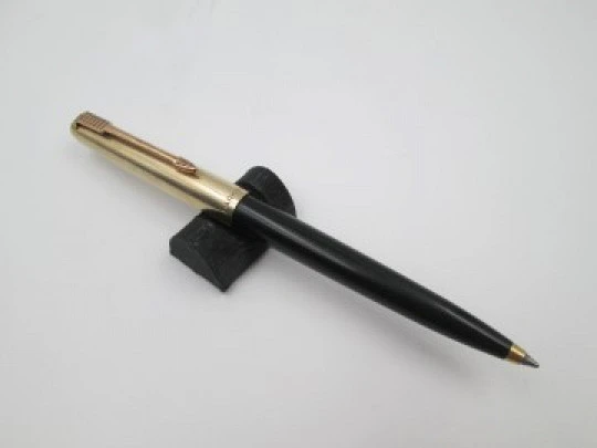 Parker 51 ballpoint pen. Black plastic and gold plated. Lines pattern. France. 1970's