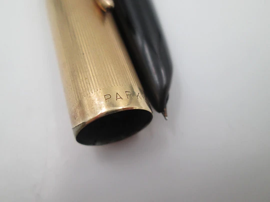 Parker 51 Vacumatic. Black plastic and gold filled. 14K gold nib. USA. 1950's