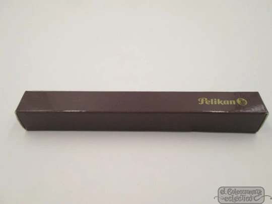 Pelikan 140. Green & black resin. Gold plated details. 1950's. Piston filler. 14K Pelikan 140. Green & black resin. Gold plated details. 1950's. Piston filler. 14K