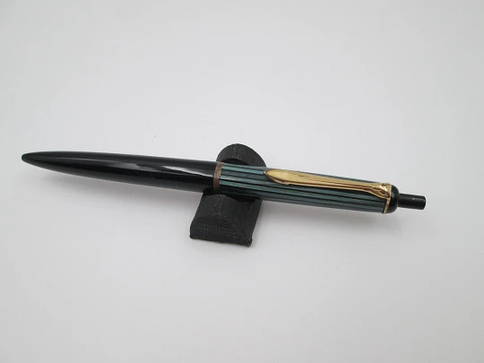 Pelikan 355 ballpoint pen. Green & black striped resin. Gold plated details. Push button