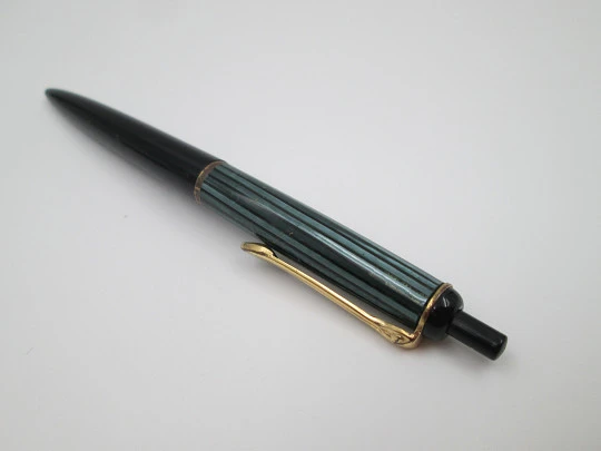 Pelikan 355 ballpoint pen. Green & black striped resin. Gold plated details. Push button