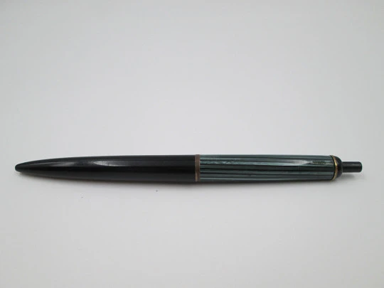 Pelikan 355 ballpoint pen. Green & black striped resin. Gold plated details. Push button