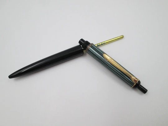 Pelikan 355 ballpoint pen. Green & black striped resin. Gold plated details. Push button