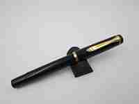 Pelikan Classic M100 fountain pen. Black resin and gold plated. Piston filler system. 1990's
