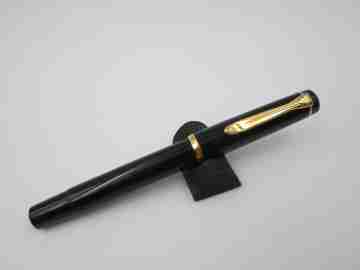 Pelikan Classic M100 fountain pen. Black resin and gold plated. Piston filler system. 1990's