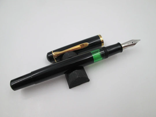 Pelikan Classic M100 fountain pen. Black resin and gold plated. Piston filler. Box. 1990's