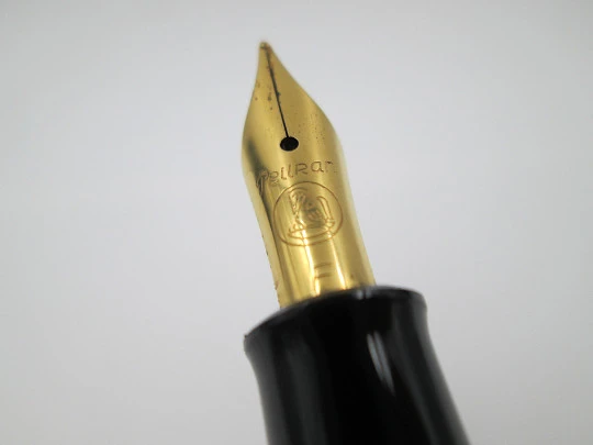 Pelikan Classic M200 fountain pen. Black resin. 24k gold plated details. Piston filler