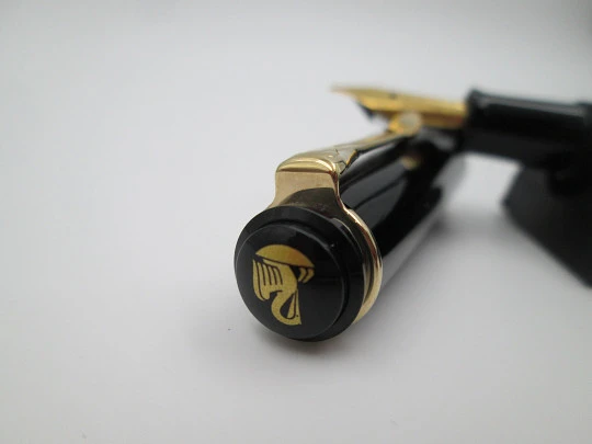 Pelikan Classic M200 fountain pen. Black resin. 24k gold plated details. Piston filler