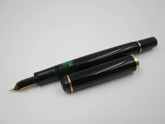 Pelikan Classic M200 fountain pen. Black resin. 24k gold plated details. Piston filler. Box