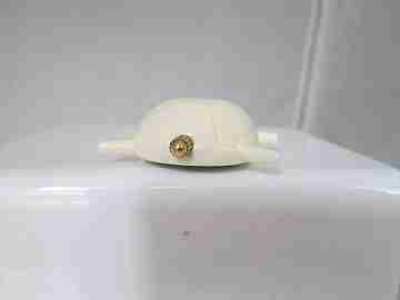 Pendant watch Lausanne. White resin. Golden metal. Turtle