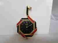 Pendant watch Lucerne. Golden metal. Black / red enamel. 1960's