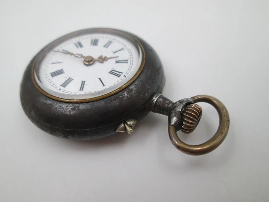 Pendant watch. Iron & gold plated. 1890's. Stem-wind. Pin-set. Porcelain dial