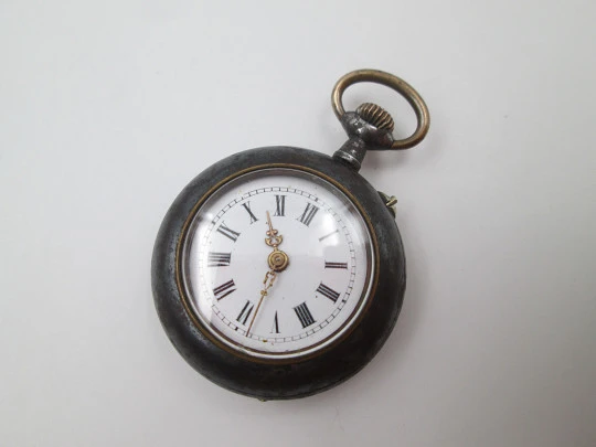 Pendant watch. Iron & gold plated. 1890's. Stem-wind. Pin-set. Porcelain dial