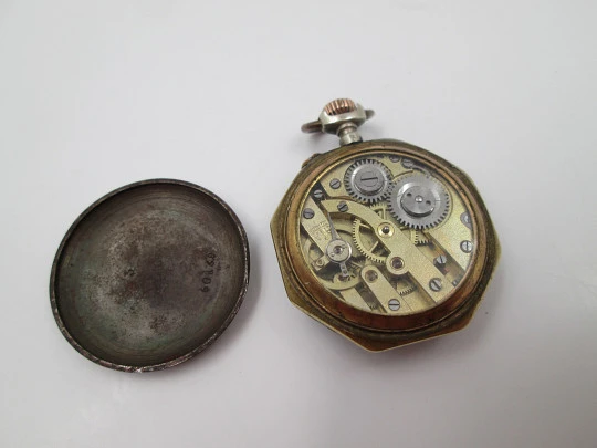 Pendant watch. Iron & gold plated. 1890's. Stem-wind. Pin-set. Porcelain dial