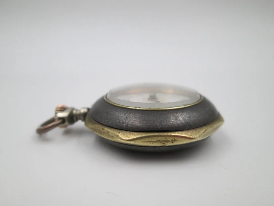 Pendant watch. Iron & gold plated. 1890's. Stem-wind. Pin-set. Porcelain dial