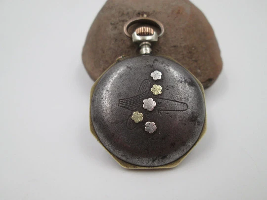 Pendant watch. Iron & gold plated. 1890's. Stem-wind. Pin-set. Porcelain dial