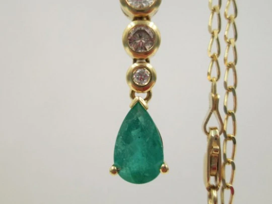 Pendant with chain. 18K gold, diamonds and emerald. 1990's