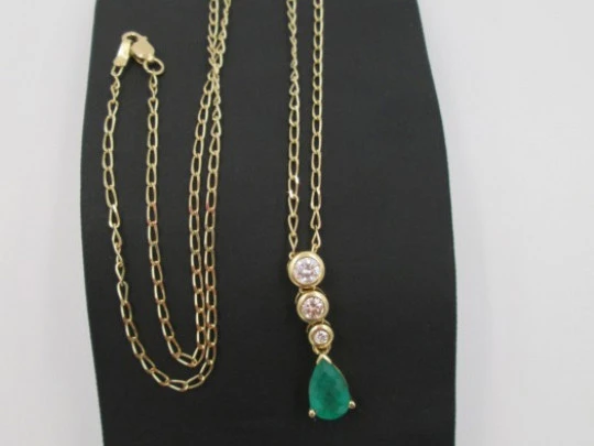 Pendant with chain. 18K gold, diamonds and emerald. 1990's