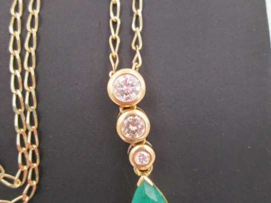 Pendant with chain. 18K gold, diamonds and emerald. 1990's