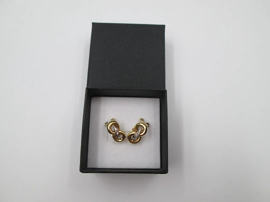 Pendientes mujer lazo. Oro amarillo y blanco 18k y diamantes. Cierre Omega