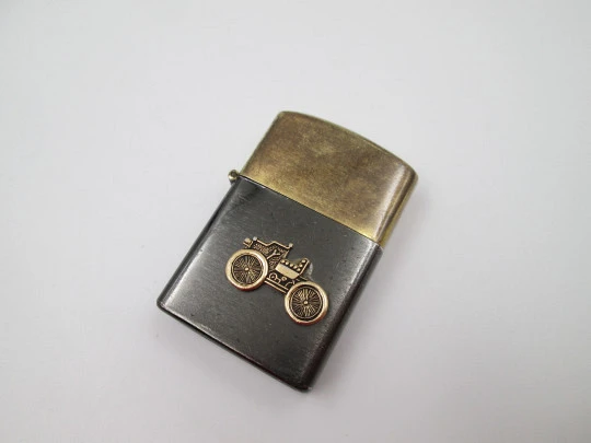 Penguin petrol pocket lighter. Golden and black brass. Ford T car motif. Japan. 1980's