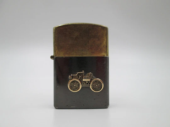 Penguin petrol pocket lighter. Golden and black brass. Ford T car motif. Japan. 1980's
