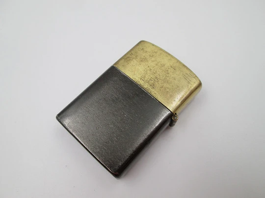 Penguin petrol pocket lighter. Golden and black brass. Ford T car motif. Japan. 1980's