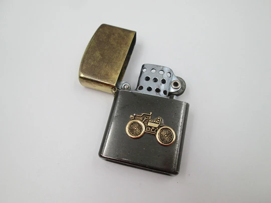 Penguin petrol pocket lighter. Golden and black brass. Ford T car motif. Japan. 1980's