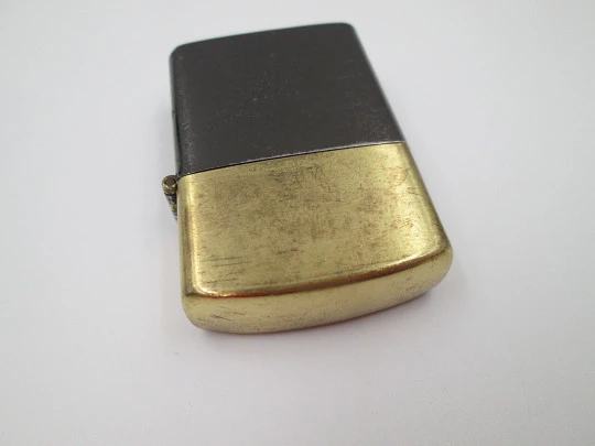 Penguin petrol pocket lighter. Golden and black brass. Ford T car motif. Japan. 1980's
