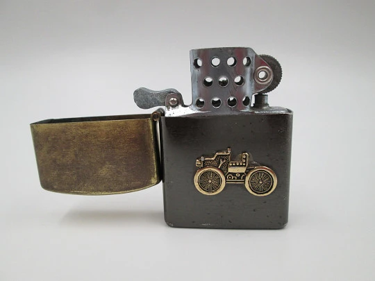 Penguin petrol pocket lighter. Golden and black brass. Ford T car motif. Japan. 1980's