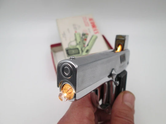 Penguin pocket petrol lighter. Aurora 45 pistol. Silver plated metal & black resin. Box. 1960's Penguin pocket petrol lighter. Aurora 45 pistol. Silver plated metal & black resin. Box. 1960's